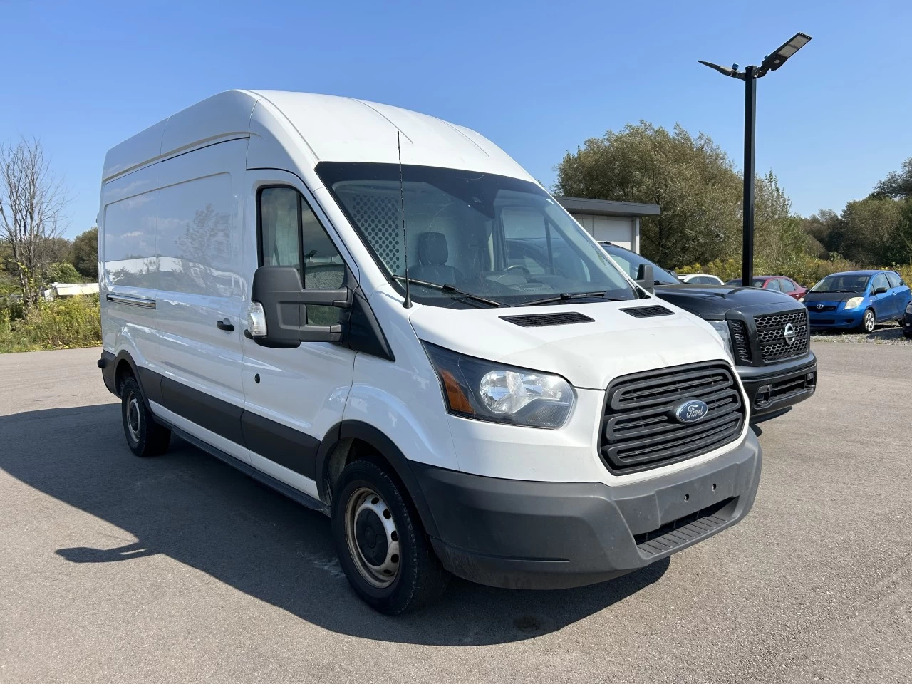 2019 Ford Transit fourgon utilitaire T-250 148" Hi Rf 9000 GVWR Sliding RH Dr Image principale